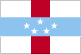 Flag of Netherlands Antilles is white, with a horizontal blue stripe in the center superimposed on a vertical red band, also centered; five white, five-pointed stars are arranged in an oval pattern in the center of the blue band.