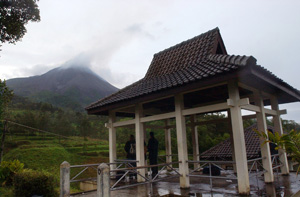 Mount Merapi spews volcanic smoke as seen from an observation post in Babadan, Indonesia, April 20, 2006. [© AP Images]