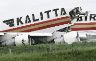 Date: 05/25/2008 Location: Brussels, Belgium Description: Firefighters stand next to the U.S.-based Kalitta Air cargo plane that split in two after crashing at the end of the runway in Zaventem near Brussels, May 25, 2008. Diplomatic Courier Tomas "Andy" Perez was honored for his heroism in securing classified U.S. diplomatic pouches and assisting the crew in the immediate aftermath of the crash. © AP Photo