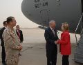 Date: 04/25/2009 Description: Secretary of State Hillary Rodham Clinton arrives in Baghdad, greeted by newly arrived U.S. Ambassador to Iraq Christopher R. Hill. Admiral Michael Mullen, Chairman of the Joint Chiefs of Staff, looks on left. Photo Credit: Eric W. Brooks, U.S .Embassy Baghdad State Dept Photo