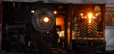 CP 2317 and diesel NKP 514 pose at the Roundhouse during a night photo session. (NPS Photo, Ken Ganz)