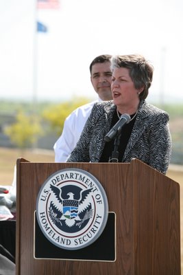 Secretary Napolitano, flanked by Congressman Henry Cuellar, discusses southwest border security efforts