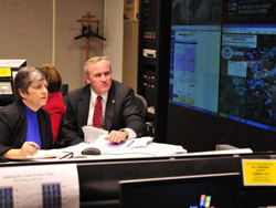 Thomas Muir briefs Secretary Napolitano about the flooding in North Dakota and Minnesota at the National Operations Center.