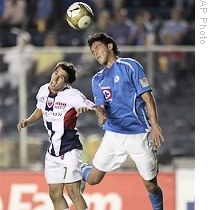 Cruz Azul's player Luis Landin, right, and Atlantes' Fernando Navarro during CONCACAF Champions League final soccer match in Mexico City, 22 Apr 2009
