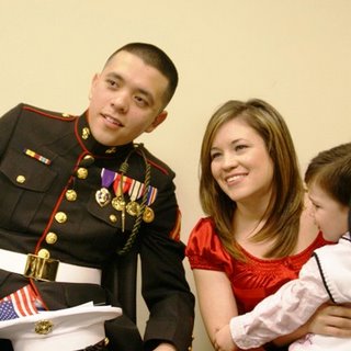 Marine Lance Corporal Jose Gasca, his wife Angelina and son.