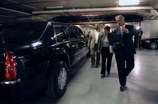 February 5, 2009 – U.S. Secret Service Director Mark Sullivan (front) and Special Agent Gregory Tate (rear) brief Secretary Napolitano on the presidential limousine, nicknamed The Beast.