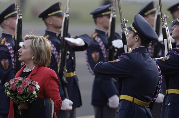 U.S. Secretary of State Hillary Clinton walks past the guard of honor upon her arrival at the Ruzyne airport in Prague, Czech Republic, Saturday, April 4, 2009. Secretary Clinton accompanied President Obama on his trip to Europe.