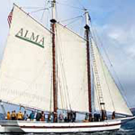 Scow schooner ALMA with her sails set on San Francisco Bay.