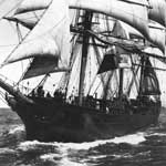 A historic photo showing a full-rigged ship (STAR OF ALASKA, also called BALCLUTHA) with sails set.