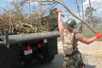 Pascagoula, Miss., September 9, 2005 -- Navy Seabees from Gulfport, Miss. cleanup debris in Pascagoula. Hurricane Katrina left extensive debris all along the Mississippi gulf coast. FEMA/Mark Wolfe FEMA/Mark Wolfe