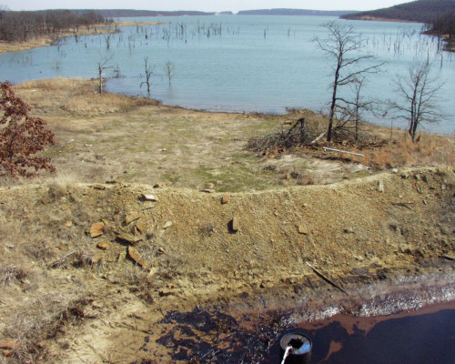 Salt scar area below the pit