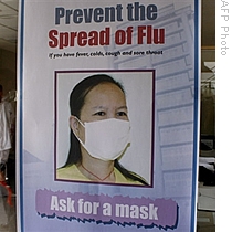 A poster on flu prevention is displayed at an isolation room for possible swine flu cases at a hospital in Manila, 04 May 2009