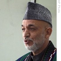 Afghan President Hamid Karzai at election commission office in Kabul, 04 May 2009