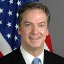 Ambassador Eric G. John