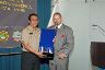 Date: 04/2009 Description: Peruvian National Police General Adolfo Mattos, officer in charge of RTC Lima, is presented with an award by Mr. Javier Jaquez, Director of ILEA San Salvador, for his outstanding support of the RTC Lima program since its inception.  State Dept Photo