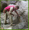 geologist study rock outcrop