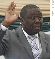 Morgan Tsvangirai is sworn in as Zimbabwe's prime minister at the State House in Harare, 11 Feb 2009
