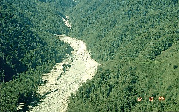 Erosion scar marks lahar pathway in Guali River valley, Nevado del Ruiz, Colombia