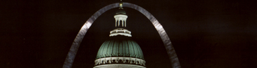 Arch and Old Courthouse at Night