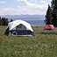 Tents are staked at the Bridge Bay campground with a beautiful view of Yellowstone Lake.