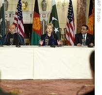 Secretary of State Hillary Clinton, center, holds a meeting with, from left, Afghan President Hamid Karzai, Pakistani President Asif Ali Zardari, 6 May 2009, at the State Department in Washington