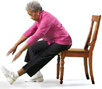 Photo of a woman doing an exercise in a chair
