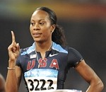 Sanya Richards of the US gestures after winning the women's 400m semifinal 2 at the 