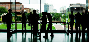 group of people in a downtown building