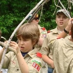 Scouts building a wigwam