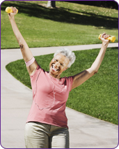 woman with free weights celebrating