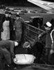 Crews unload flour at Tempelhof Airport. 