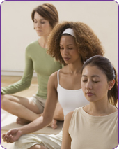 group of 3 women doing yoga
