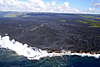 Lava entered the ocean yesterday for the first time since June 2007. A small delta, extending for about 100 m along the face of the sea cliff, had been constructed by this morning.