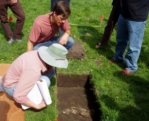 Participants in Prospection in Depth 2008 inspect an adobe wall foundation identified at El Presidio de San Francisco using ground penetrating radar.