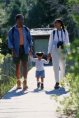 Photo of a family taking a walk.