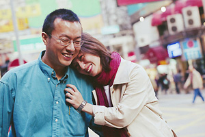 Man and woman laughing together