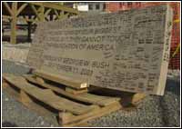 Arlington, VA, March 7, 2002 -- A memorial inscribed on a piece of limestone, from the original quarry used in the building, is at the reconstruction site at the Pentagon. Photo by Jocelyn Augustino/ FEMA News Photo