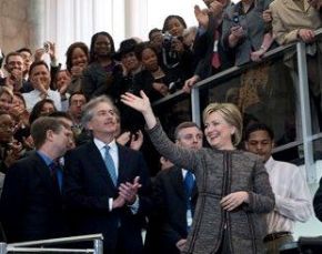 Date: 01/22/2009 Location: Washington, DC Description: Secretary of State Hillary Rodham Clinton, surrounded by employees, greets Department of State employees on her first day at the Department. © AP Photo