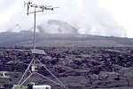 HVO scientists working on gas-monitoring stations, Kilauea Volcano, Hawai`i