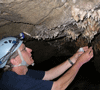 Alan Mix taking dripwater samples in a cave