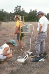 Scientists using chamber and analyzer at Puhimau thermal area, Kilauea Volcano
