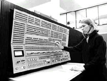 Scientist works with a large IBM computer (circa 1960)