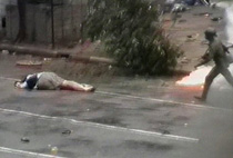 Kenji Nagai, Japanese journalist as he lays in the street after being shot during a protest in Rangoon, Myanmar, on Thursday Sept 27,2007.AP