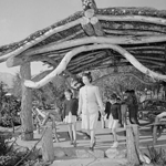 Woman with children underneath the gazebo of Merritt Park. Photo by Ansel Adams.