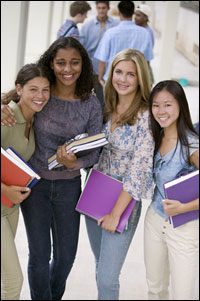 Photo: Four smiling students