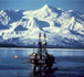 Photo of a platform in water and behind a snowy mountain