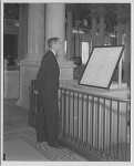 Attorney General Tom Clark looking at Bill of Rights