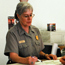 Photo of a ranger working at an information center.