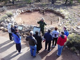 ranger talking to group of visitors at tusayan museum