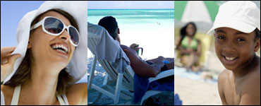 Photo: People on the beach demonstrating sun-protective practices 